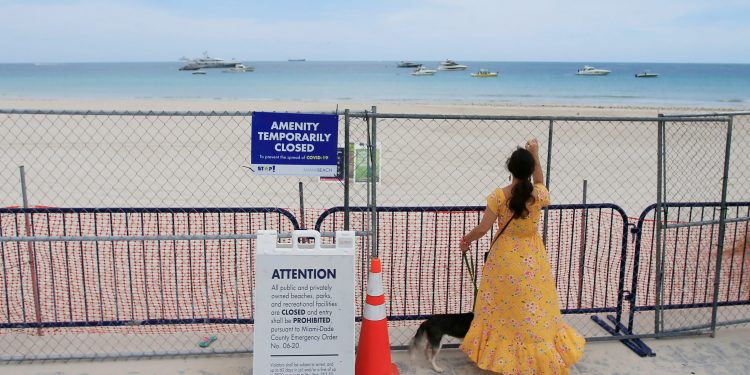 Florida reports more than 11,000 new coronavirus cases, another daily