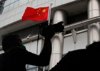 Australia ends Hong Kong extradition treaty, extends visas