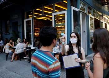 Virus surges. Work hours plateau. U.S. may be flattening the wrong curve