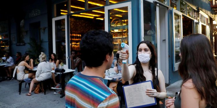 Virus surges. Work hours plateau. U.S. may be flattening the wrong curve