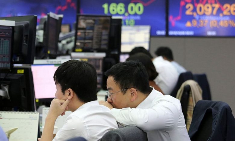 Photo of Asian exchanges closed in different directions.